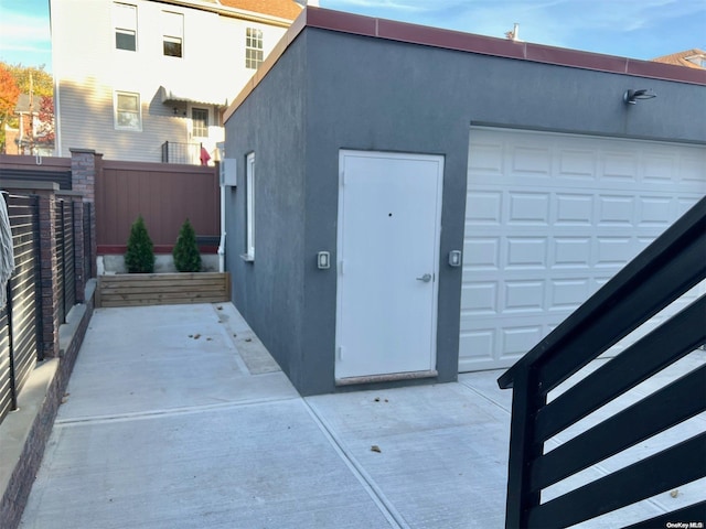 exterior space with a garage