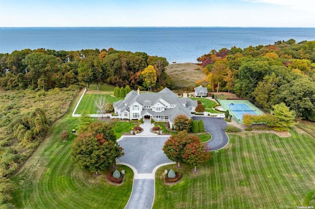 birds eye view of property featuring a water view