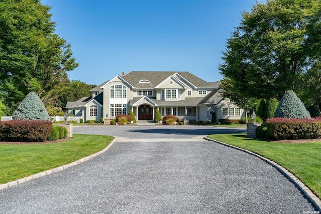 view of front of home with a front yard