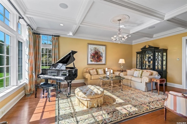 living room featuring a healthy amount of sunlight, coffered ceiling, and hardwood / wood-style flooring