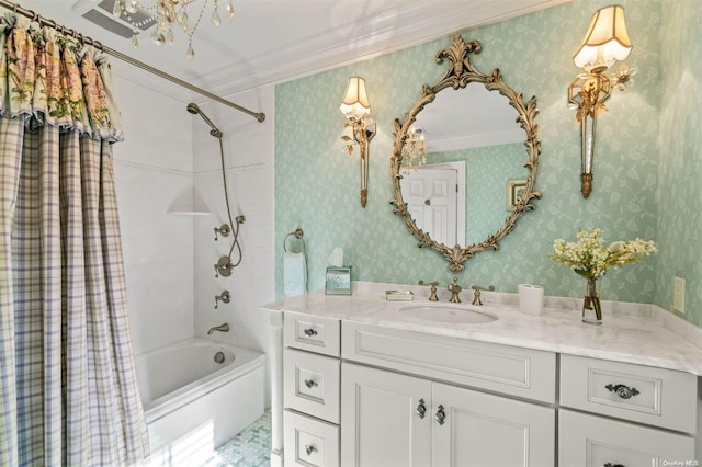 bathroom featuring vanity, ornamental molding, and shower / tub combo