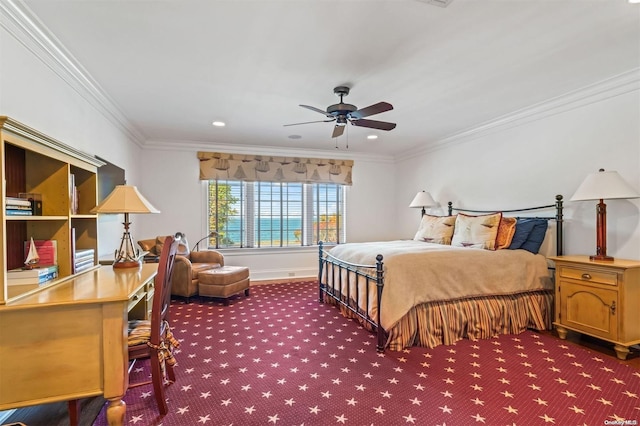 carpeted bedroom with a water view, ceiling fan, and crown molding