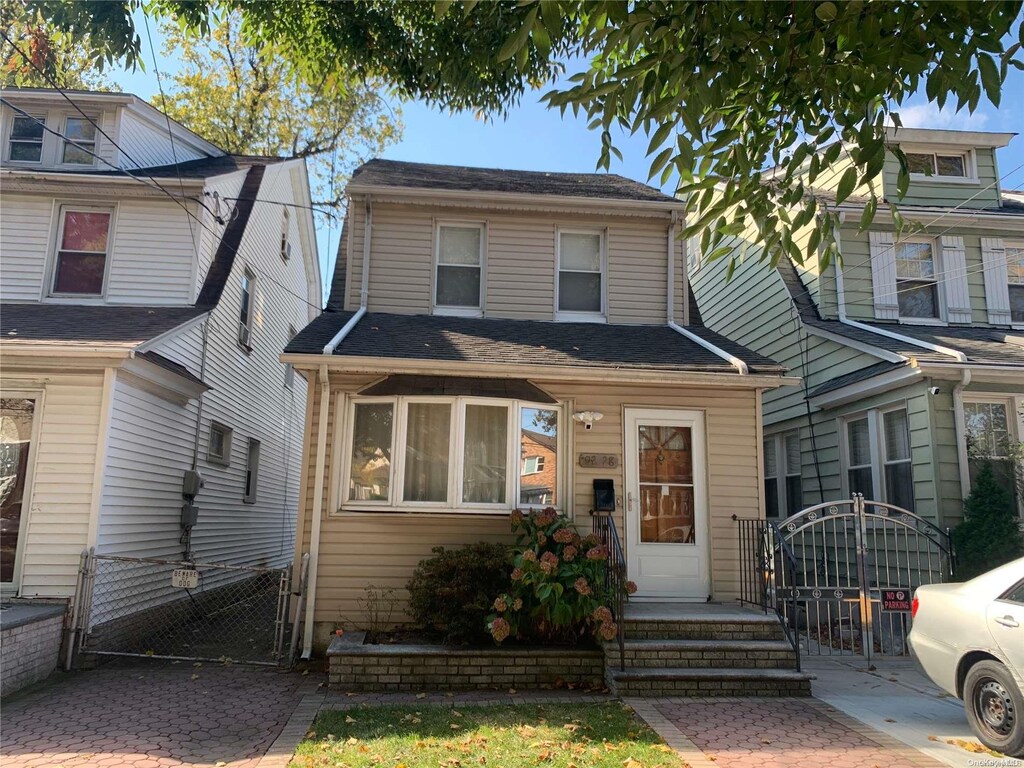 92-28 218th Pl, Queens Village, NY 11428 - view of front of property featuring a gate