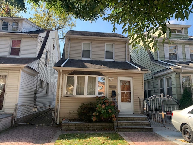 92-28 218th Pl, Queens Village, NY 11428 - view of front of property featuring a gate