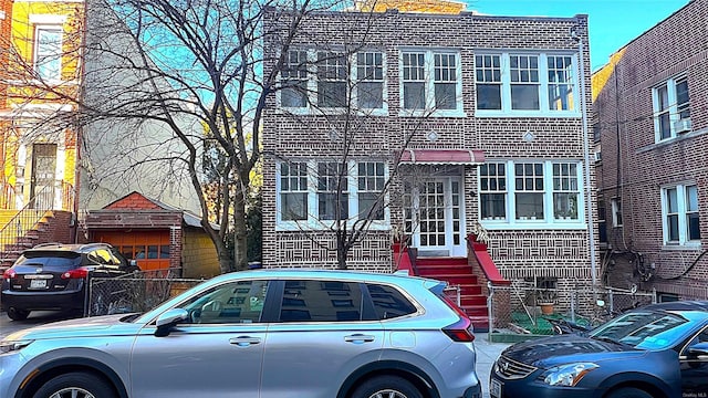 view of front of property with entry steps