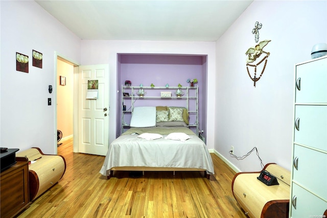 bedroom featuring light hardwood / wood-style floors