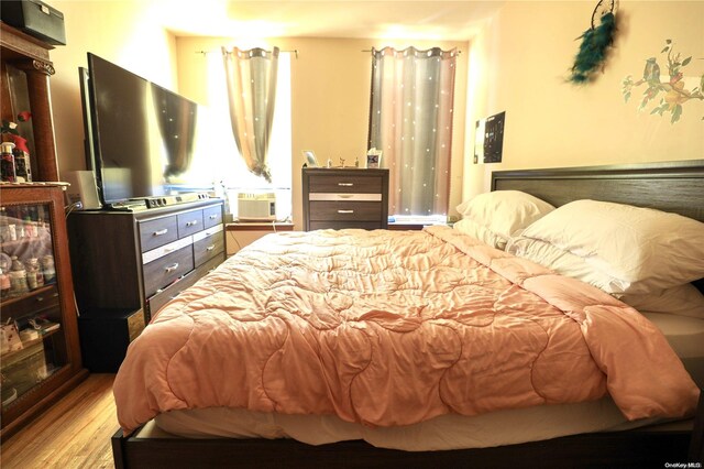 bedroom with light wood-type flooring