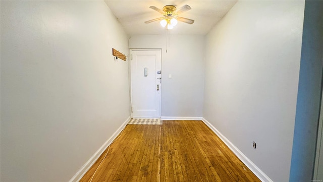 hall featuring wood-type flooring