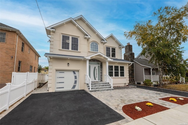 front facade with a garage