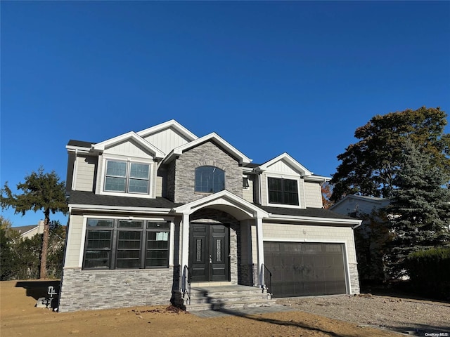 craftsman-style house featuring a garage