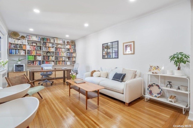 sitting room with hardwood / wood-style floors