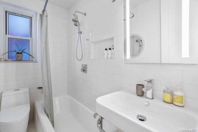 bathroom with shower / tub combo, backsplash, toilet, and tile walls