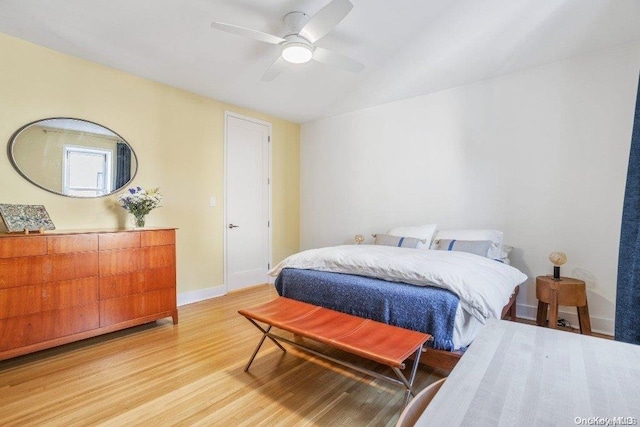 bedroom featuring ceiling fan and light hardwood / wood-style floors