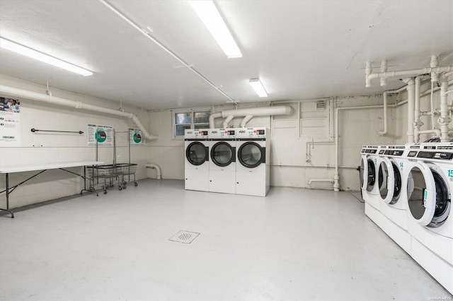 laundry area with washing machine and dryer