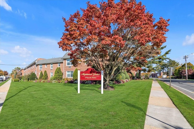 exterior space with a front lawn