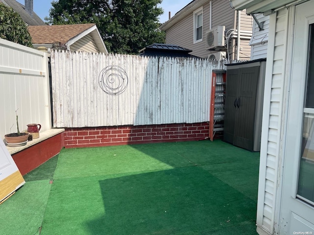 view of yard featuring ac unit