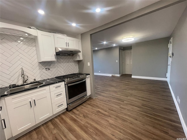 kitchen with white cabinetry, stainless steel range with gas stovetop, backsplash, dark wood-type flooring, and sink