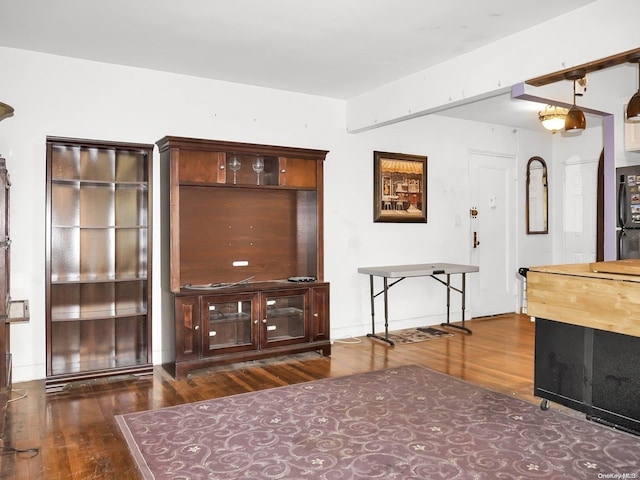 interior space with dark hardwood / wood-style flooring