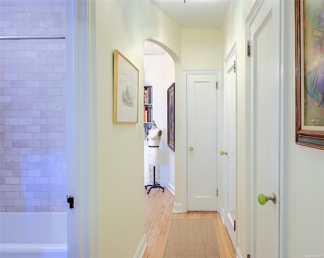 hallway featuring light hardwood / wood-style flooring