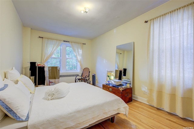 bedroom featuring hardwood / wood-style flooring