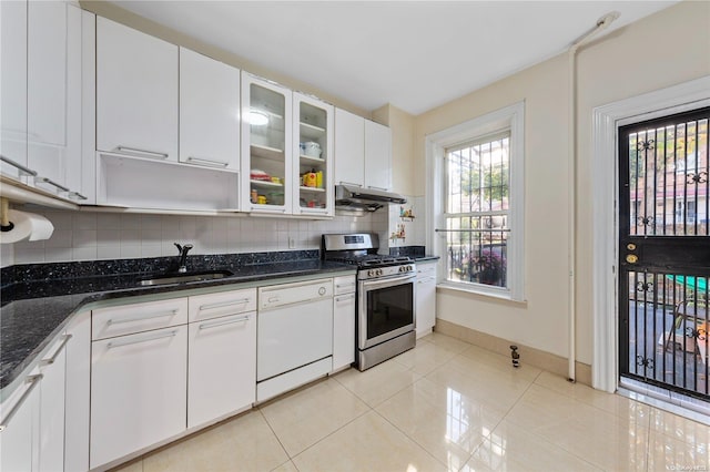 kitchen with tasteful backsplash, stainless steel gas range oven, white cabinetry, and dishwasher