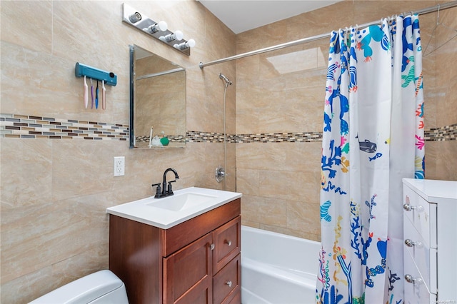 full bathroom with vanity, toilet, shower / bathtub combination with curtain, and tile walls