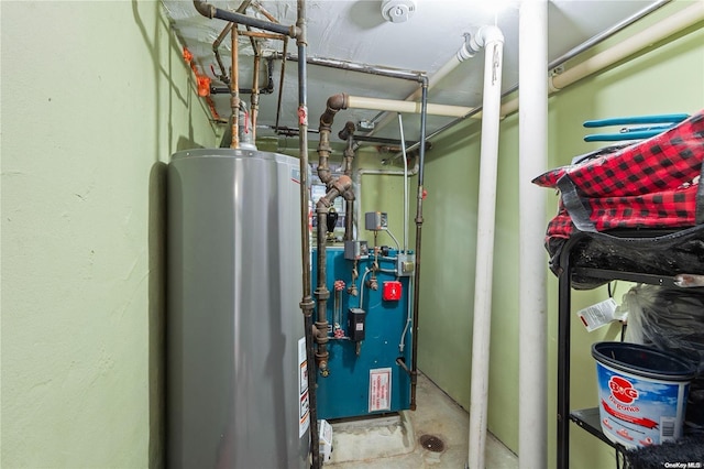 utility room with gas water heater