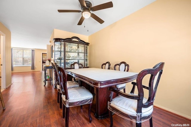 dining room featuring dark hardwood / wood-style floors and ceiling fan