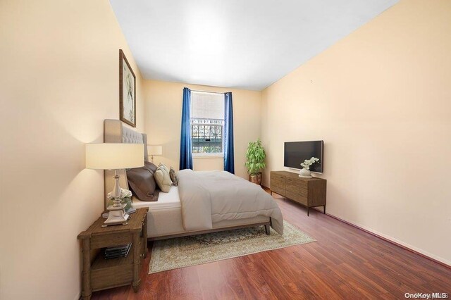 bedroom featuring wood-type flooring