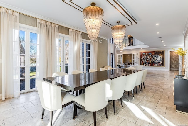 dining room featuring crown molding and a chandelier