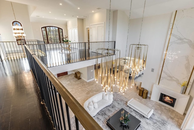 hallway with a chandelier