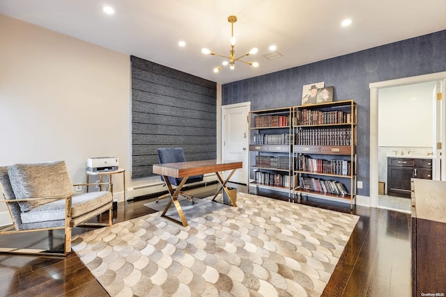 office space featuring hardwood / wood-style flooring and an inviting chandelier