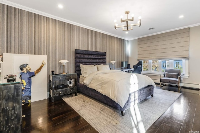 bedroom with dark hardwood / wood-style floors, crown molding, and a chandelier