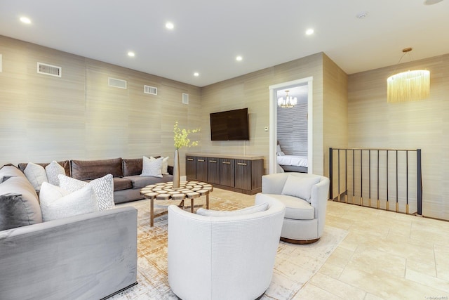 living room featuring an inviting chandelier