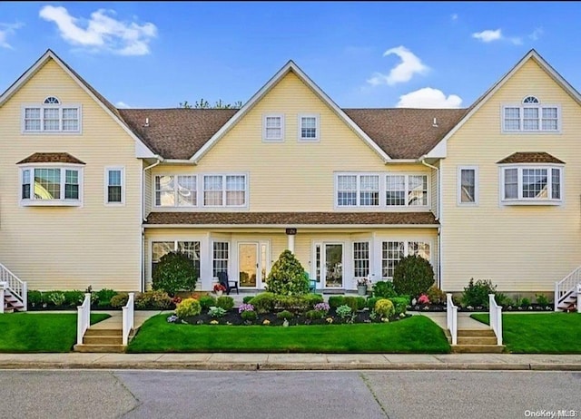 view of front of home with a front yard