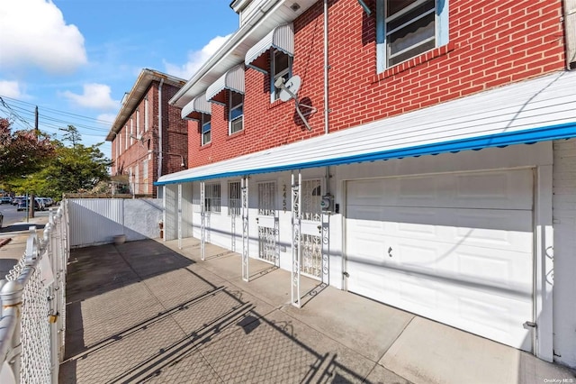 exterior space with a garage