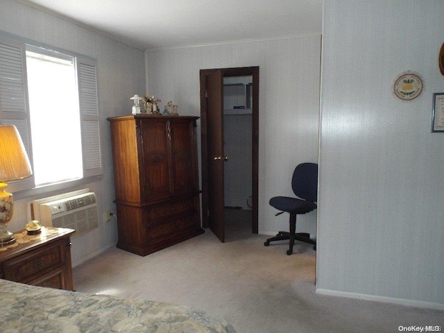 carpeted bedroom with a wall mounted air conditioner and ornamental molding