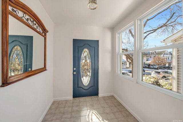 foyer entrance featuring plenty of natural light