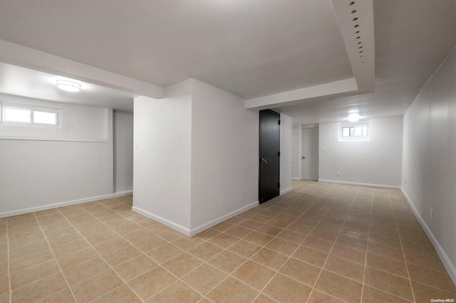 basement with light tile patterned floors