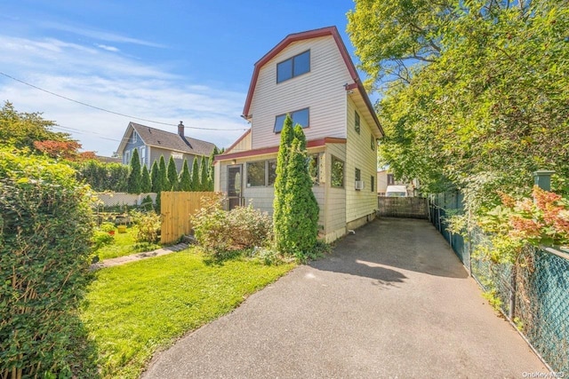4 Maple St, Glenwood Landing, NY 11547 - view of front of house with asphalt driveway and a gambrel roof