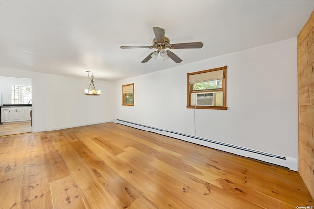 4 Maple St, Glenwood Landing, NY 11547 - empty room featuring baseboard heating, a chandelier, ceiling fan, light wood-type flooring, and cooling unit
