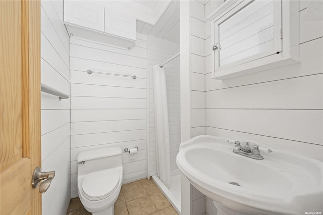 4 Maple St, Glenwood Landing, NY 11547 - full bathroom with a stall shower, a sink, toilet, and tile patterned floors