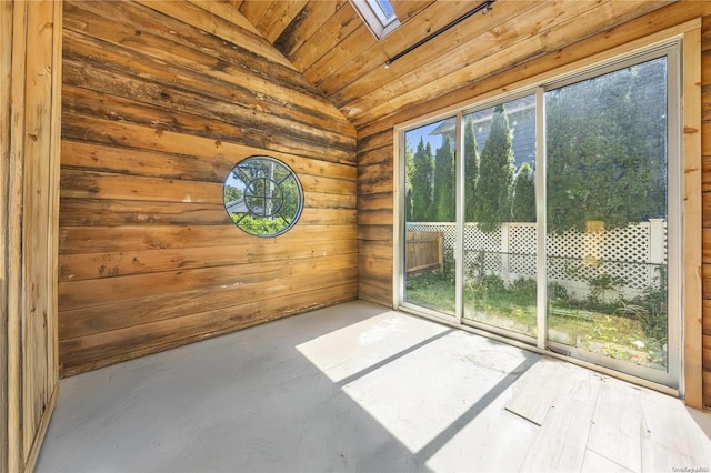 4 Maple St, Glenwood Landing, NY 11547 - unfurnished sunroom with a skylight and lofted ceiling