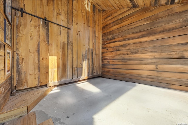 4 Maple St, Glenwood Landing, NY 11547 - empty room featuring wooden walls and concrete flooring