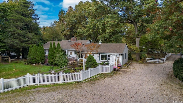 view of front of home with a front lawn