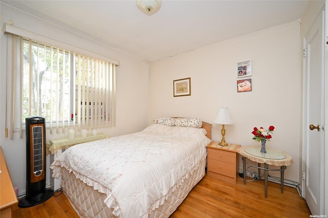 bedroom featuring hardwood / wood-style floors