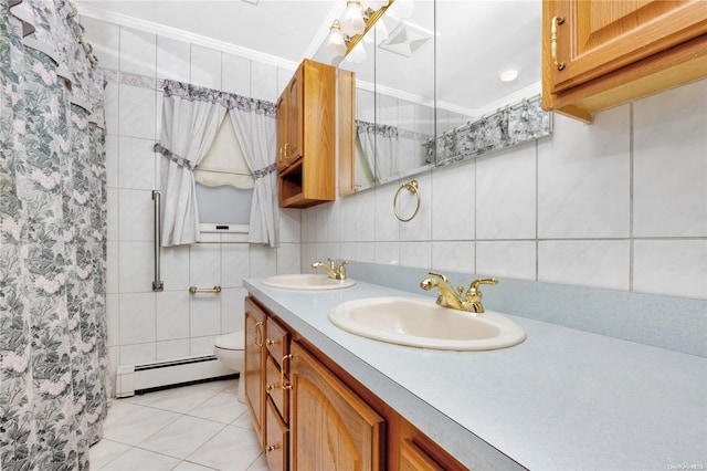 bathroom with tile patterned flooring, ornamental molding, tile walls, and a baseboard heating unit