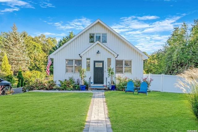 modern farmhouse with a front yard