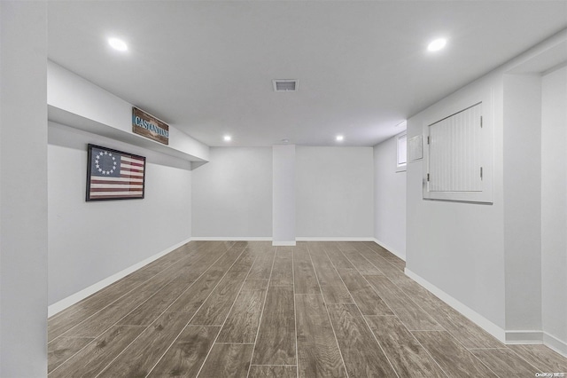 basement featuring hardwood / wood-style flooring