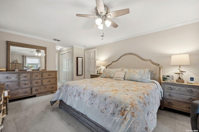 bedroom with ceiling fan, ornamental molding, and light carpet